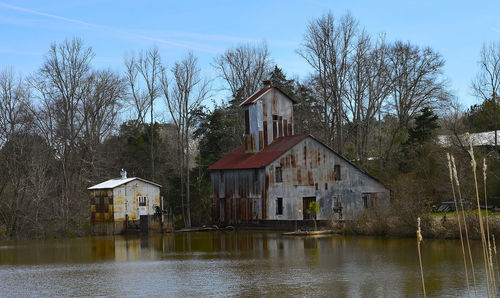 Built structure with trees in foreground