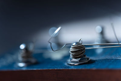 Close-up of electric lamp on table