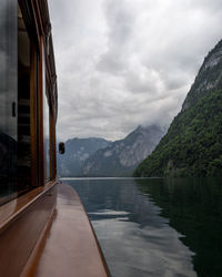 Scenic view of mountains against cloudy sky