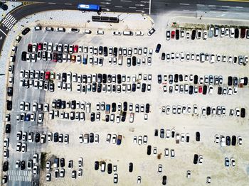 High angle view of text on street against buildings in city