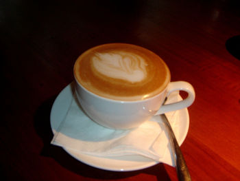 Close-up of cappuccino on table