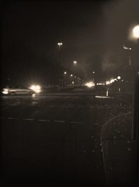 Illuminated street light at night