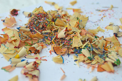 High angle view of pencil shavings on table