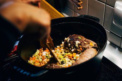 High angle view of beef roulade in cooking pan