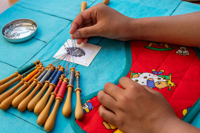 Cropped image of man working on table