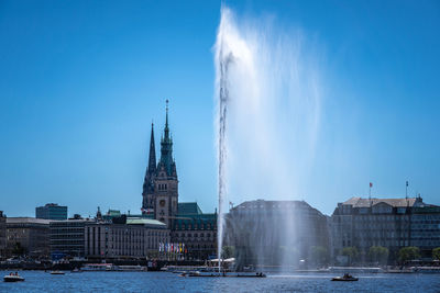 Panoramic view of buildings against sky in city