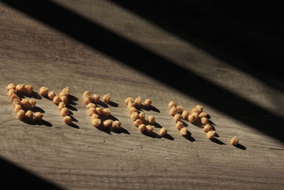 High angle view of text made from chickpea on table