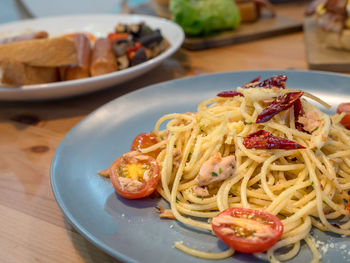 Close-up of noodles served in plate on table