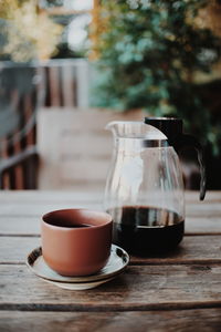 Close-up of coffee cup on table