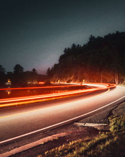 Light trails on road at night