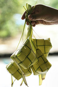 A bunch of ketupat, a traditional malay cuisine made with the coconut leaves for eid celebration.