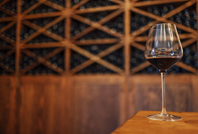 Close-up of wineglass on table