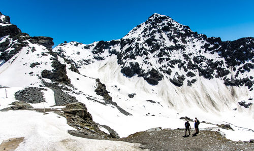 Scenic view of snow covered mountains