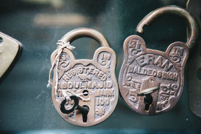 Close-up of padlocks on metal
