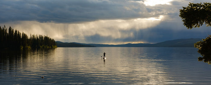 Paddle boarder on bonaparte lake
