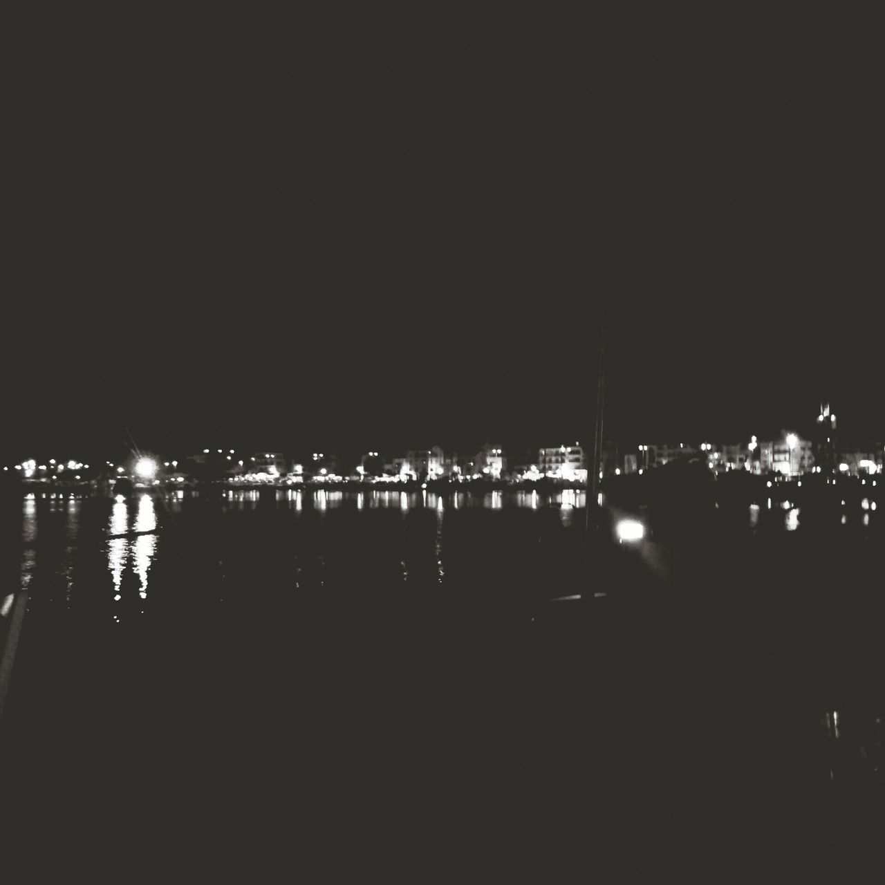 night, illuminated, copy space, city, architecture, dark, clear sky, building exterior, built structure, lighting equipment, cityscape, water, reflection, light - natural phenomenon, sky, river, outdoors, waterfront, light, no people