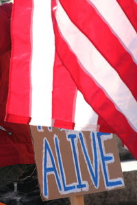 Close-up of red flag with text