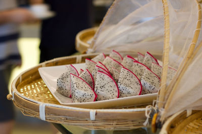 Bamboo tray with exotic red dragon fruit slices