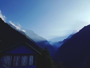 High section of built structure against mountains