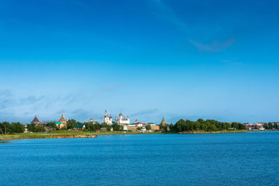 Scenic view of sea against blue sky