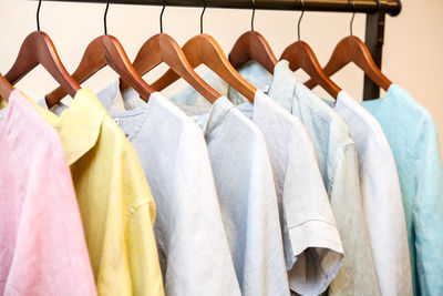 Clothes hanging on rack in store