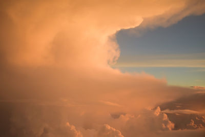 Low angle view of dramatic sky during sunset