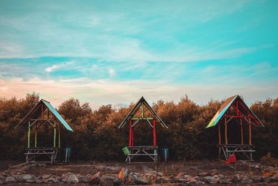 Empty playground against clear sky