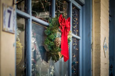 Close-up of wreath on window