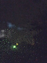 High angle view of wet road at night