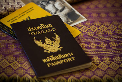 Close-up of passport on table