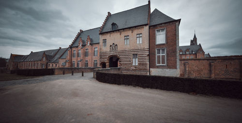 Low angle view of old building against sky