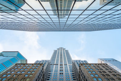 Low angle view of modern buildings against sky