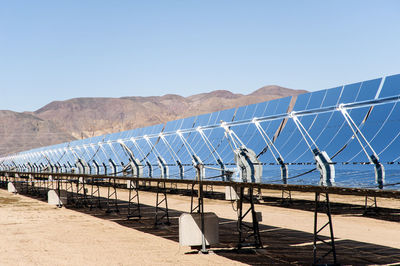 Row of parabolic mirrors at hydroelectric power plant, newberry springs, california