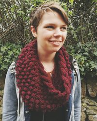 Portrait of a smiling young woman in garden