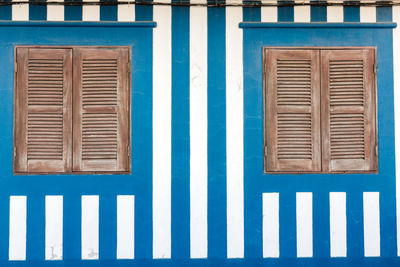 Detail of a typical facade of aveiro, yellow stripped wall.costa nova, aveiro, portugal