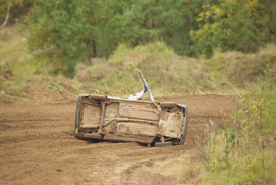 Abandoned truck on field