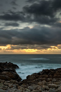 Scenic view of sea against sky during sunset