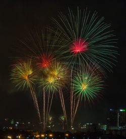 Firework display at night