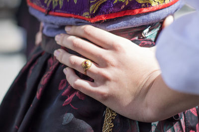 Midsection of woman with hand on hip