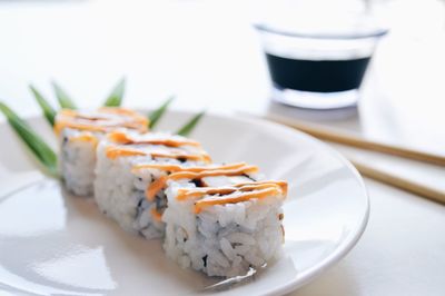 Close-up of sushi served in plate