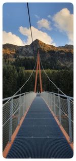 Bridge over river against sky