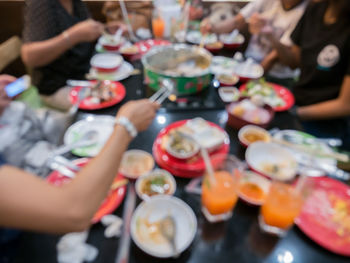 High angle view of people on table