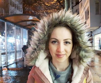 Portrait of smiling young woman outdoors