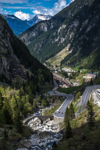 High angle view of road amidst mountains against sky