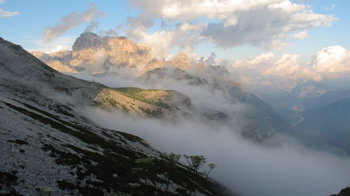 Scenic view of mountains against sky during winter