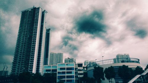 Low angle view of modern buildings against sky