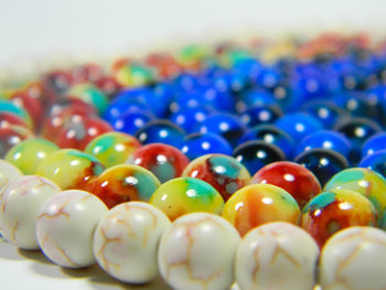 Close-up of multi colored candies on table