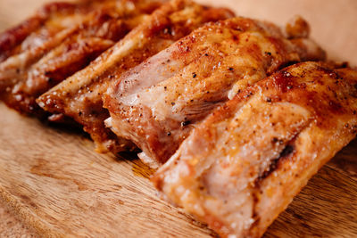 High angle view of meat on barbecue grill