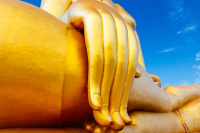 Close-up of yellow statue