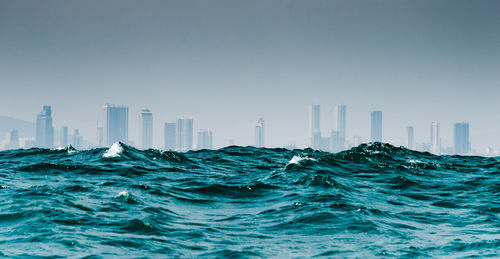 Nha trang city seen behind large swell